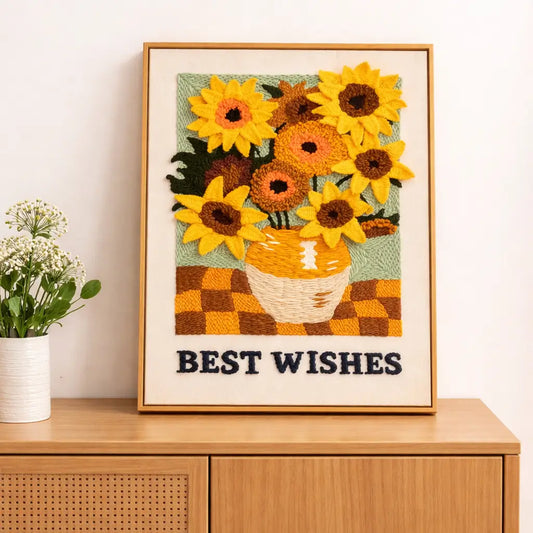 Framed sunflower punch needle embroidery artwork displayed on wooden cabinet home decor