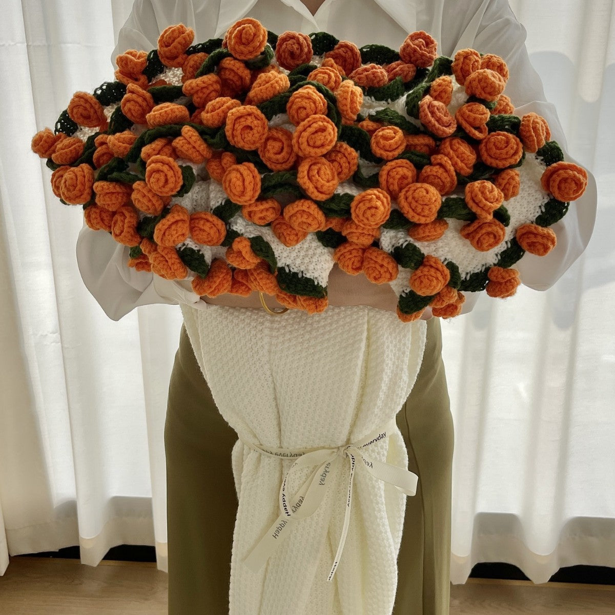 Handmade crochet flower bouquet blanket with yellow rose detail, boho nursery throw