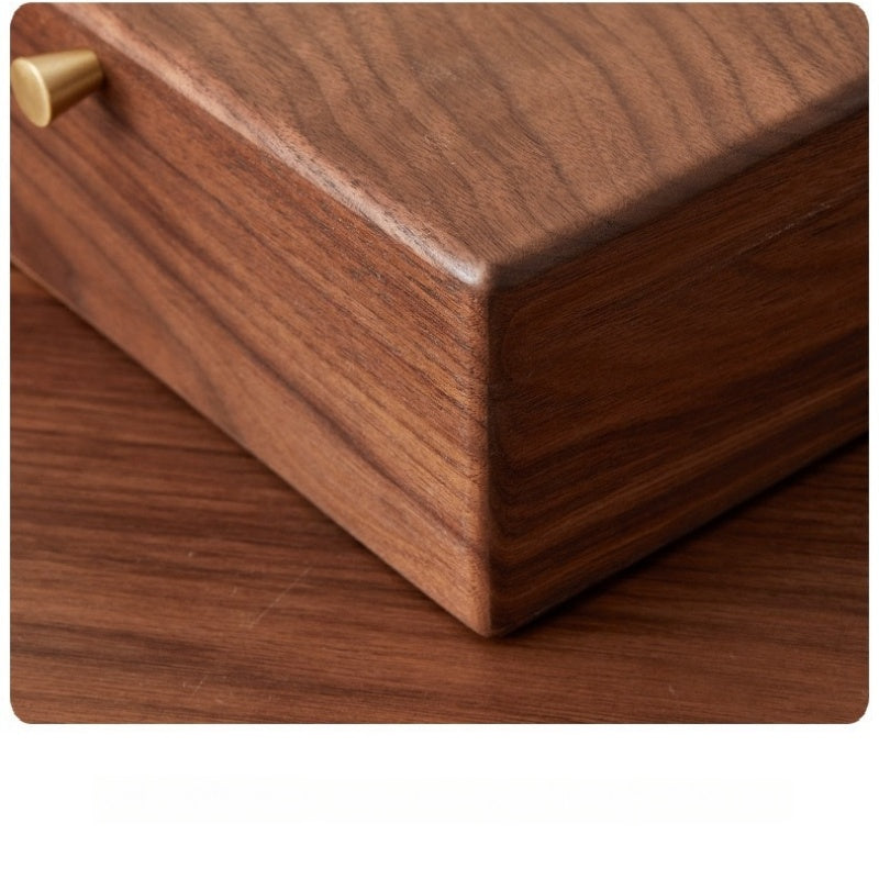 Rounded corners and natural grain of solid black walnut jewelry box