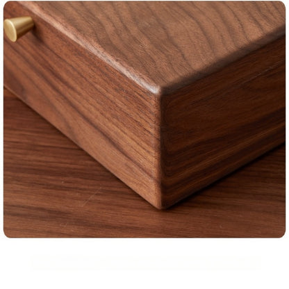 Rounded corners and natural grain of solid black walnut jewelry box
