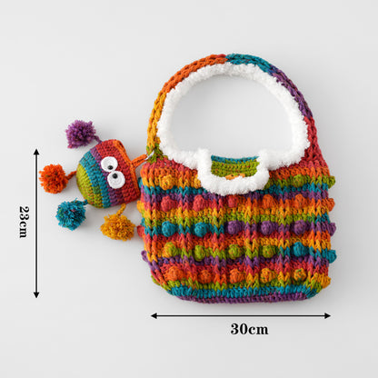 Open colorful crochet handbag with soft white trim, fabric lining and zip pocket detail.