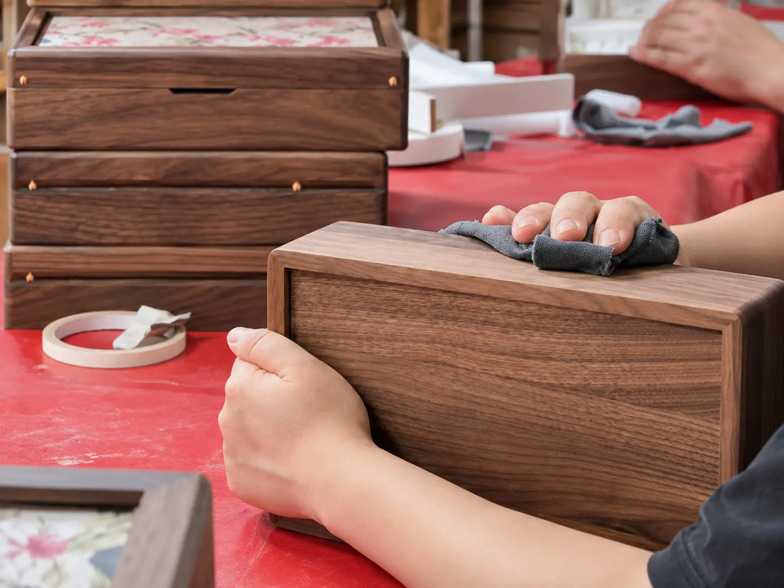AI-edited illustration based on supplier footage: wiping the wooden surface of a jewelry box
