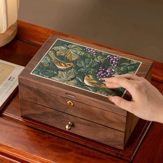 Solid wood jewelry box with colorful raised lacquer artwork of birds and grapes on the lid