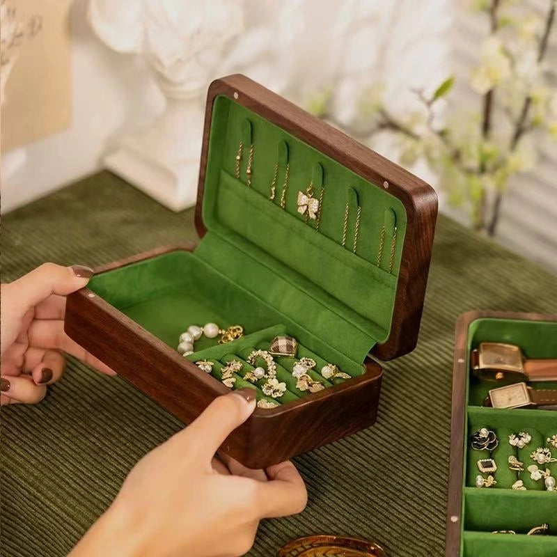 Small Fern jewelry box showing necklace tabs, ring rolls and green velvet lining