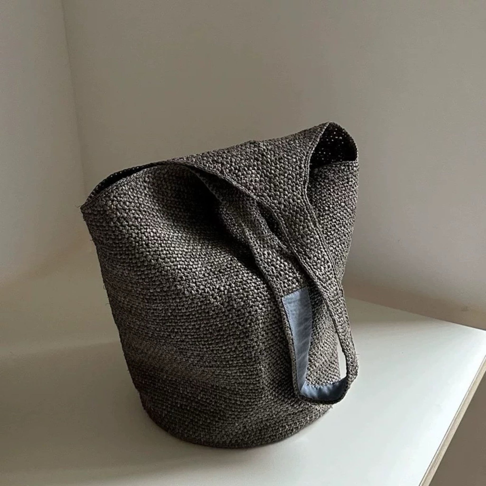  Gray handwoven raffia large-capacity bucket tote bag side view