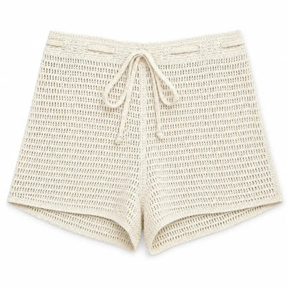Cream crochet shorts with an openwork knit texture, elastic waistband, and adjustable drawstring on a white background