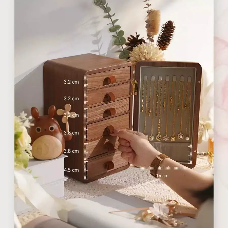 Haven six-drawer black walnut jewelry box open, showing necklace hooks and lower pocket inside the side door and drawer-front height markings