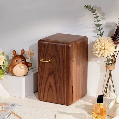 Haven solid black walnut jewelry cabinet with rounded corners and a brushed brass door handle