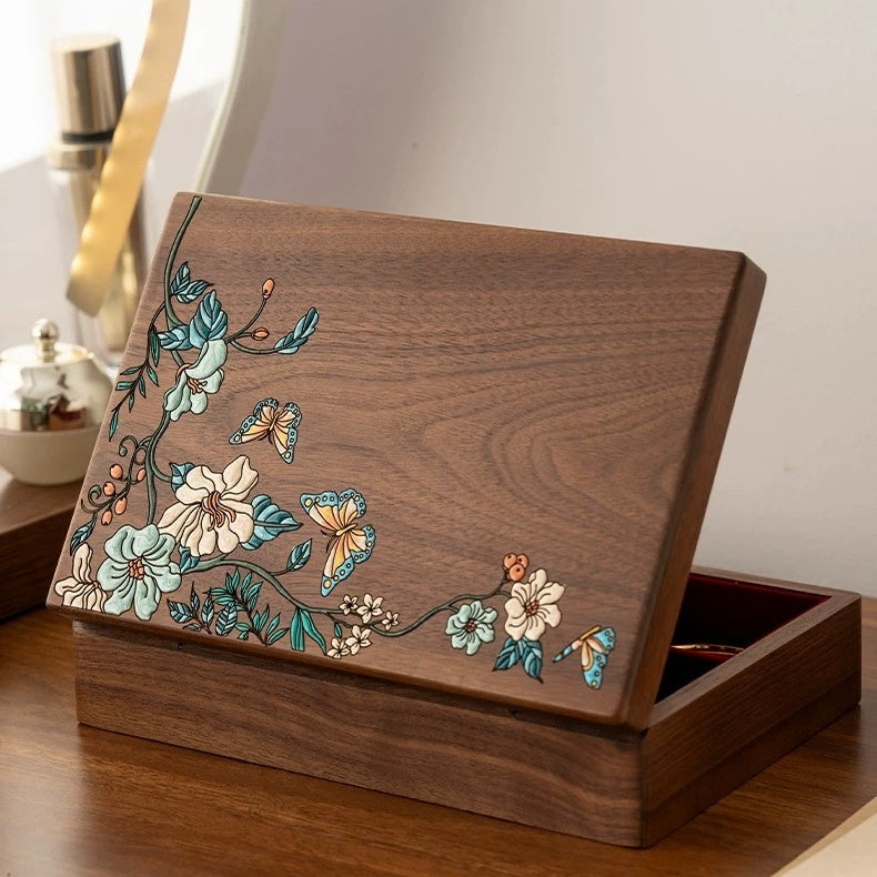 Huadie lacquer-art jewelry box with lid partly open, showing the walnut construction