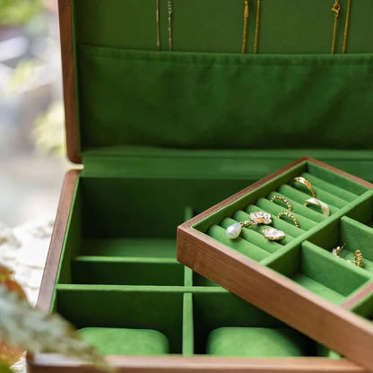 Green velvet compartments and removable tray inside the Sylvan walnut jewelry box