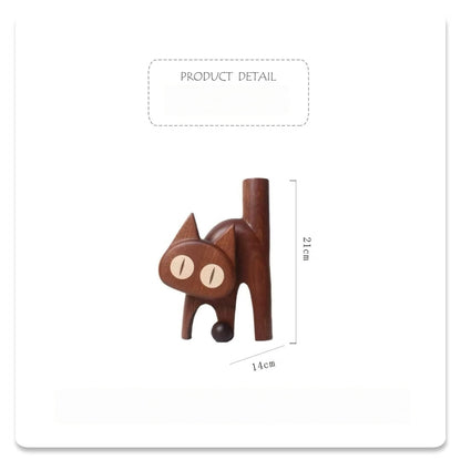 Dark wooden cat vase dimensions showing 14 cm wide and 21 cm high.