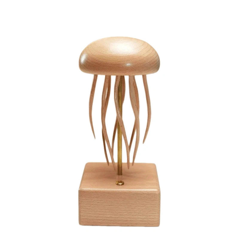 Wooden jellyfish kinetic sculpture with flowing tentacles and a natural wood base, designed as unique home and desk decor.